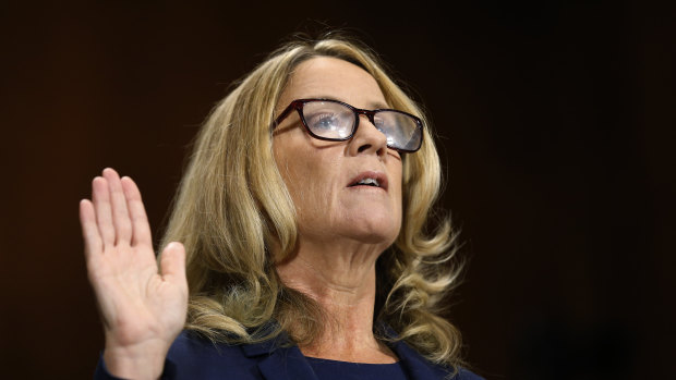 Christine Blasey Ford is sworn in before recounting her allegation of sexual assault to the Senate Judiciary Committee, 