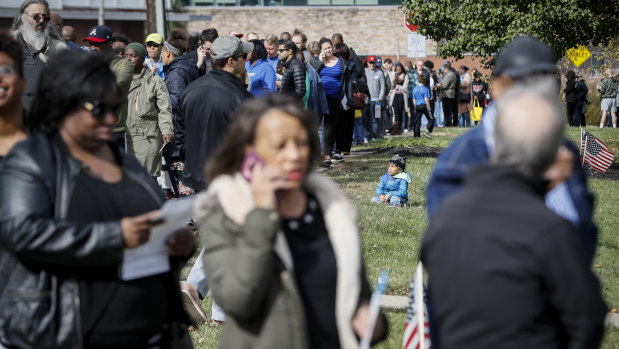 A line forms for early voting in Cincinnati on Sunday..