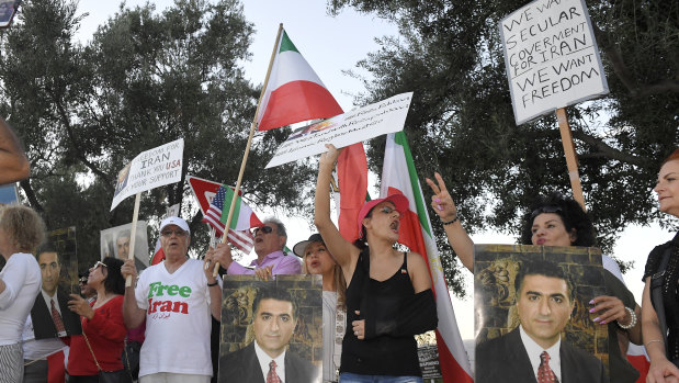 Protesters against the Iranian regime stand outside the Ronald Reagan Presidential Library and Museum where US Secretary of State Mike Pompeo was speaking on Sunday. 