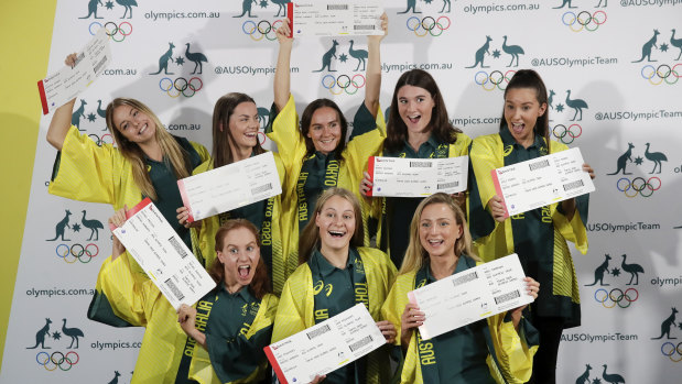 The Australian artistic swimming team with their tickets to Tokyo on Wednesday.