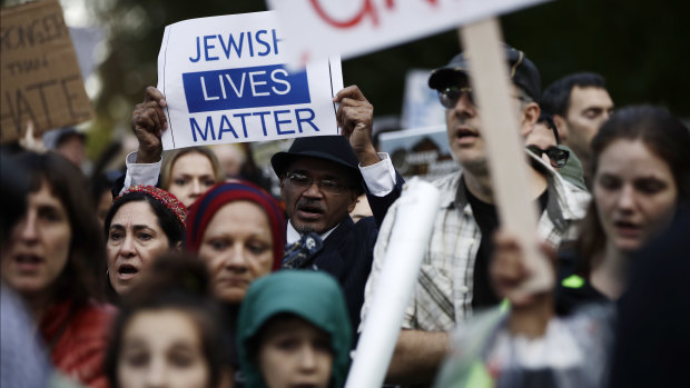 Protesters demonstrate near Pittsburgh's Tree of Life synagogue. 