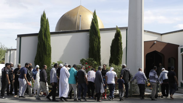 Worshippers prepare to enter the Al Noor mosque following last week's mass shooting in Christchurch, New Zealand, on Saturday.