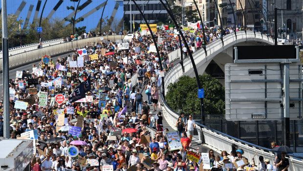 Organisers estimated more than 30,000 people marched across Victoria Bridge from Brisbane's CBD to South Brisbane.