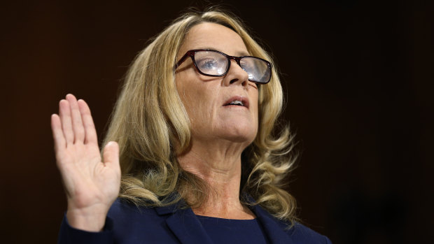 Christine Blasey Ford is sworn in before recounting her allegation of sexual assault to the Senate Judiciary Committee, 