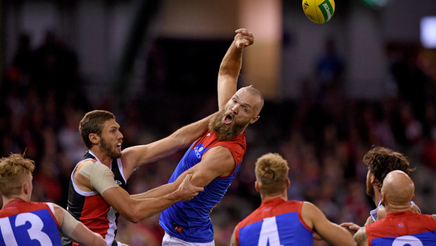 High and mighty: Melbourne's Max Gawn gets in top spot during a  ruck contest.