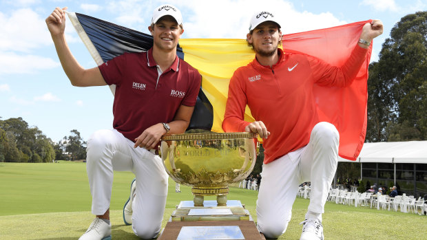 Flying the flag: Belgium's Thomas Detry, left,, and Thomas Pieters pose with the winning trophy after taking out the World Cup of Golf.