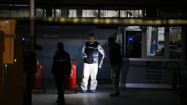 Turkish police crime scene investigators, looking for possible clues into the killing of Saudi journalist Jamal Khashoggi, work in an underground car park, where authorities Monday found a vehicle belonging to the Saudi consulate, in Istanbul.