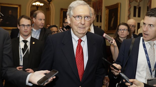 Senate Majority Leader Mitch McConnell speaks to reporters as the US hurtles closer to a government shutdown.