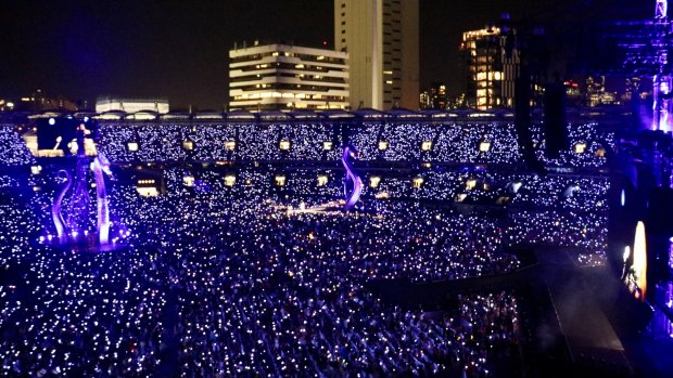 Wristbands adorned by Swift's fans light up the Gabba.