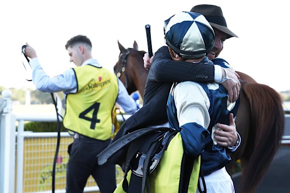 Ciaron Maher and Ethan Brown embrace after Jimmysstar’s win in the All Aged Stakes.