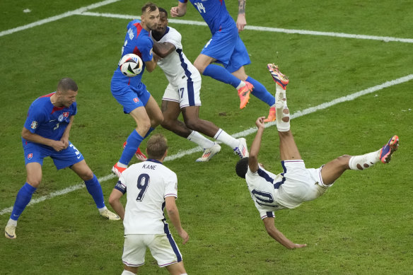 Jude Bellingham scores an acrobatic late equaliser for England.