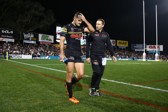 Nathan Cleary leaves the field on Sunday night.