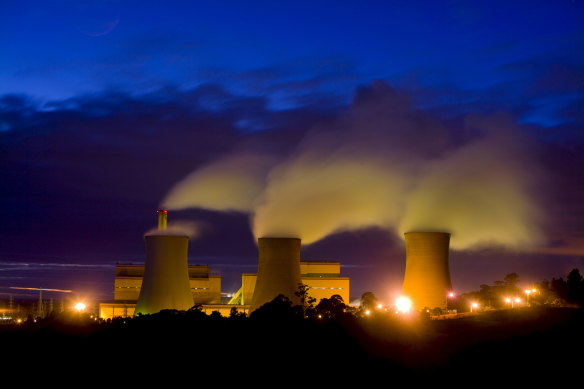 Steam pours out of the cooling towers at Yallourn power station. 