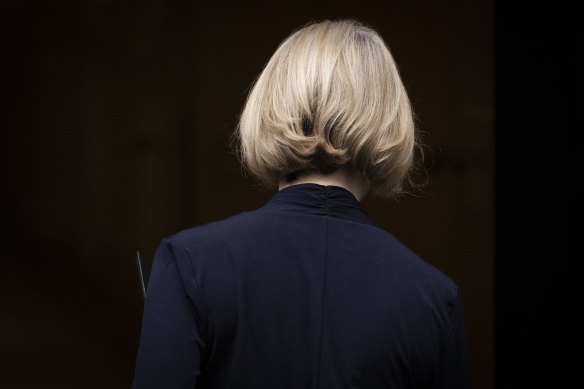 Liz Truss walks into No 10 Downing Street after announcing her resignation on Thursday.