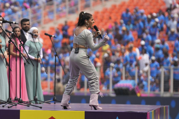 Indian singer Sunidhi Chauhan performs at the non-broadcast pregame ceremony.