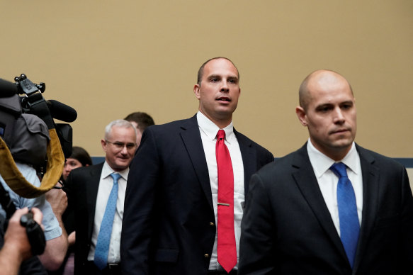 Ryan Graves, David Grusch and David Fravor arrive for the House oversight and accountability committee’s hearing on Unidentified Anomalous Phenomena. 