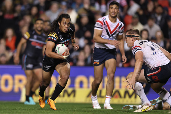 Jarome Luai makes a break for the try line.