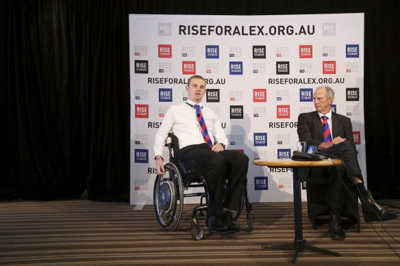 Alex McKinnon and Wayne Bennett
at a press conference for the Rise for
Alex Round in 2014. 