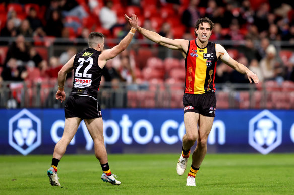 Max King celebrates one of his four goals with teammate Jack Higgins.