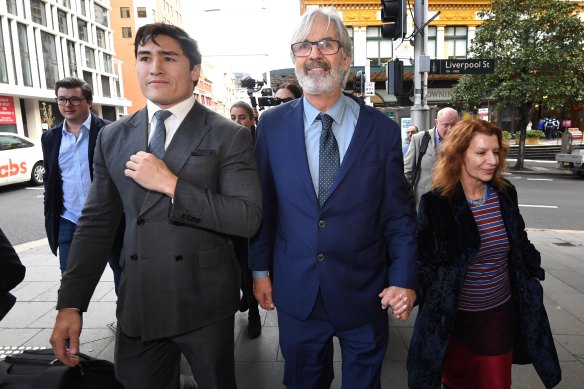 Jarratt leaves court in Sydney in July with wife Rosa Miano.