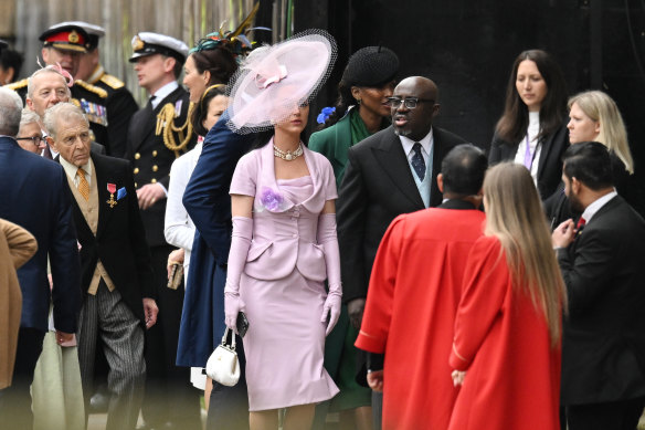 Singer Katy Perry and Vogue editor Edward Enninful arriving at Westminster Abbey.