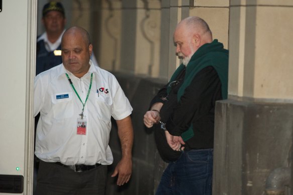 John Coombes (right) leaves the Melbourne Supreme Court in 2011.