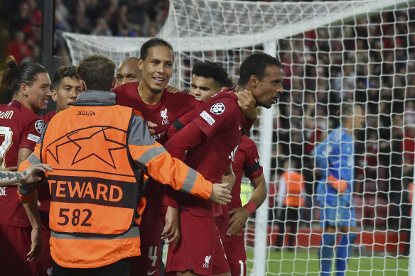 Joel Matip celebrates his 89th-minute winner for Liverpool.