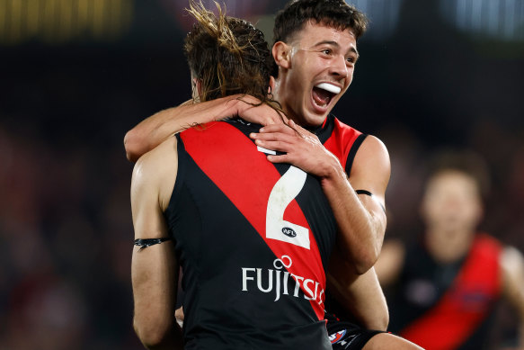 Massimo D’Ambrosio and Sam Draper (left) celebrate the matchwinning goal 