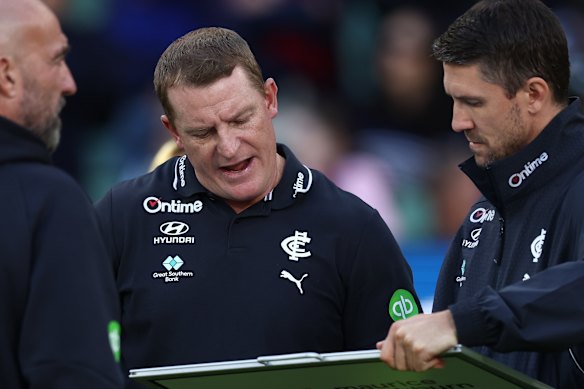 Michael Voss looks for answers as Carlton capitulate against Melbourne on Sunday.