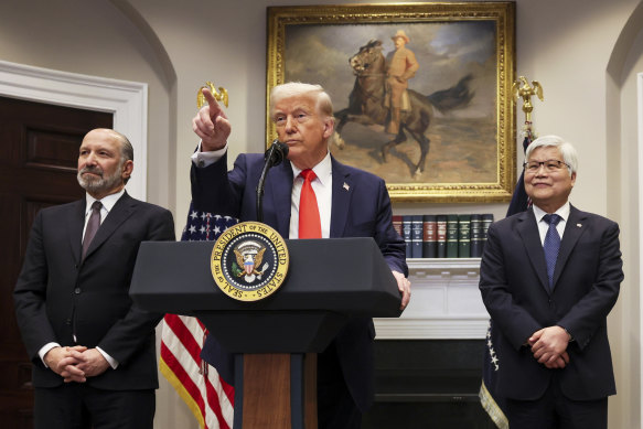 US President Donald Trump speaks alongside Commerce Secretary Howard Lutnick (left) and C.C. Wei, the head of Taiwan Semiconductor Manufacturing Company.