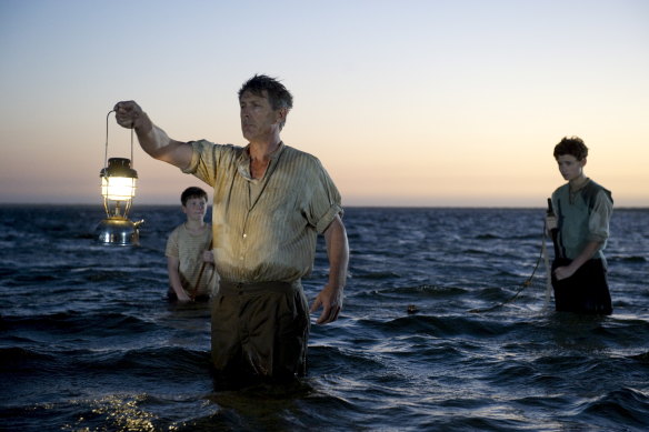 From left: Tom Russell as the young Fish Lamb, Geoff Morrell as Lester Lamb and Callan McAuliffe as the young Quick Lamb in the TV adaptation of Cloudstreet.