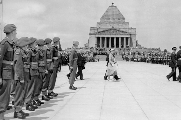 The Queen walks across the Shrine of Remembrance's forecourt on her 1954 tour. 