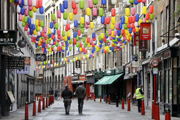 People walk through a quiet Chinatown in London. A review of the British government’s foreign policy advocates for more Chinese investment in the UK.