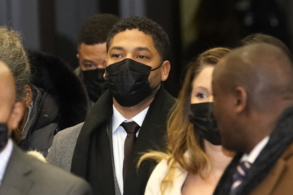 Actor Jussie Smollett, centre, returns to courthouse after the jury notified Cook County Judge James Linn that they had reached a verdict.