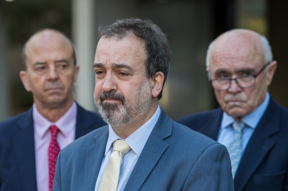 The Minister for Tourism, Sport and Major Events, Martin Pakula flanked by Australian Grand Prix Corporation chief executive Andrew Westacott (left) and chairman Paul Little at a press conference to announce the cancellation of the Melbourne grand prix and Moto GP for another year.