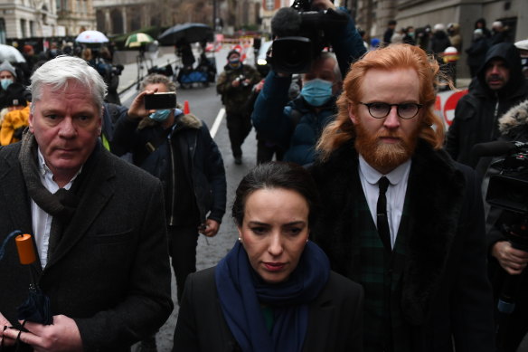 Editor-in-chief of WikiLeaks Kristinn Hrafnsson (left) and Julian Assange's girlfriend, Stella Moris-Smith Robertson (centre), arrive for the hearing.