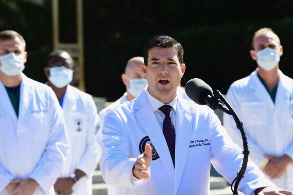 Dr Sean Conley, White House physician, speaks at a press conference outside of Walter Reed National Military Medical Center in Bethesda, Maryland, US, on Saturday, October 3, 2020. 