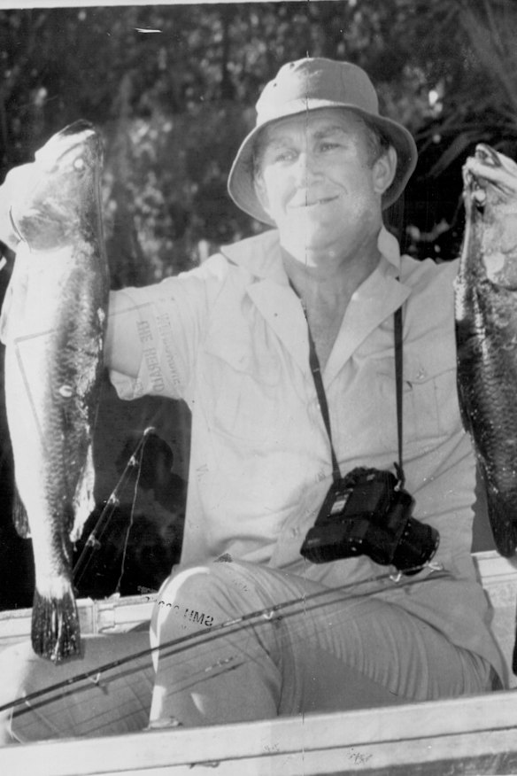 Malcolm Fraser showing off his catch in Arnhem Land after a fishing trip with Yunupingu.  