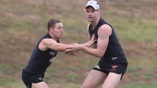 Essendon recuirts Devon Smith (left) and Jake Stringer will provide extra firepower.