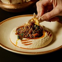 Hummus topped with Fraser Isle spanner crab and Mooloolaba prawns.
