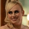 Rebel Wilson is a spy masquerading as someone who designs plinths for cat shows in Bride Hard.