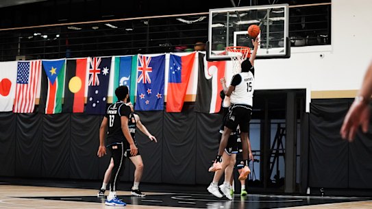 Ariel Hukporti goes up for the ball at Melbourne United training.