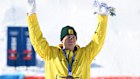 Matt Graham celebrates on the podium after extending Australia’s medal run at the Winter Olympics.