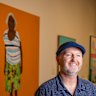 Richard Lewer with his Archibald Prize-winning portrait of Iluwanti Ken at the Art Gallery of NSW.