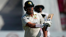 Matt Renshaw swings his bat as he leaves the field following his dismissal on day four.