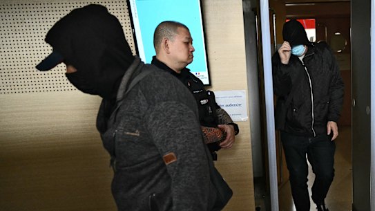 Dominique Pelicot’s co-accused pass security on arrival at the court in Avignon.