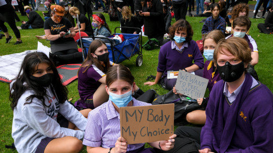 Leo Day and a attend the rally at Treasury Gardens.