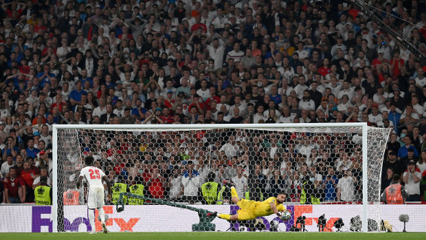 The crowd watches England miss the last penalty in a shootout with Italy during the final of the UEFA Euro 2020 on July 11.