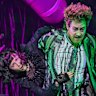 Karis Oka and Eddie Perfect in a scene from Beetlejuice.