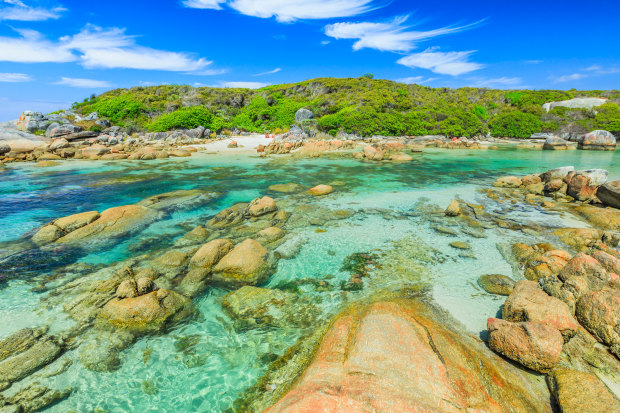 Sheltered waters are surrounded by rock formations at Madfish Bay in WA’s William Bay National Park. 